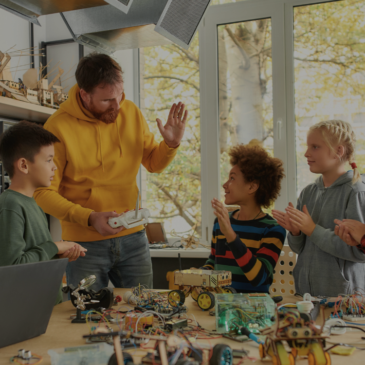 Teacher and student in makers class 